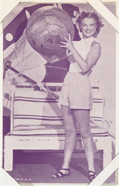 Actress holding beach ball (W423) — Unknown
