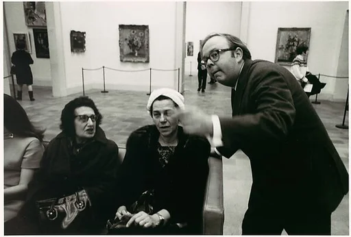 [Henry Geldzhaler Addressing Two Museum-Goers]