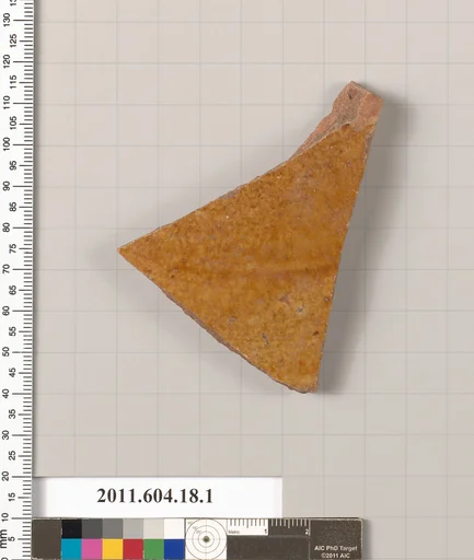 Fragment of a glazed ceramic plate or bowl