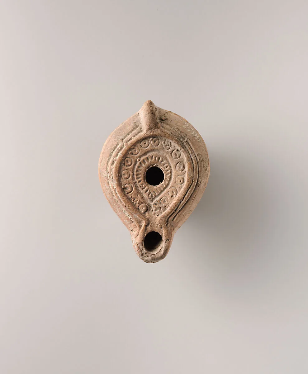 Terracotta oil lamp — Unknown