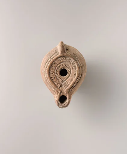 Terracotta oil lamp