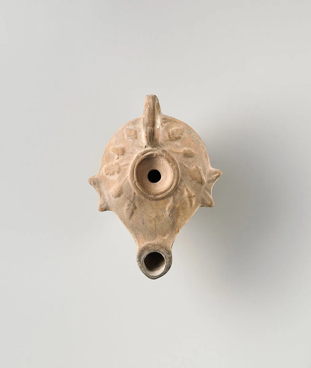 Terracotta oil lamp — Unknown