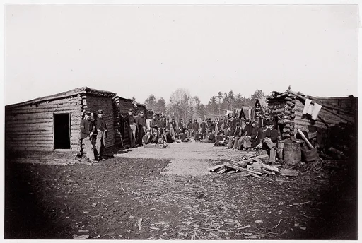 [Winter Quarters, troops with row of cabins].  Brady album, p. 128
