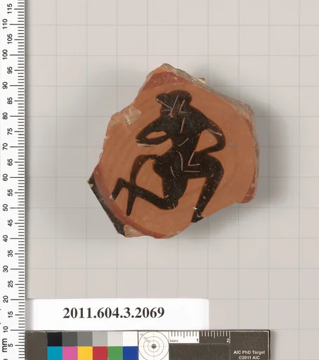 Terracotta fragment of a kylix (drinking cup)