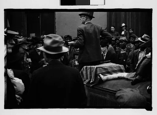 [Crowd Listening to Speaker Standing on Car Fender, Milledgeville, Georgia]