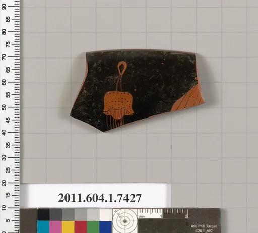 Terracotta rim fragment of a kylix (drinking cup)