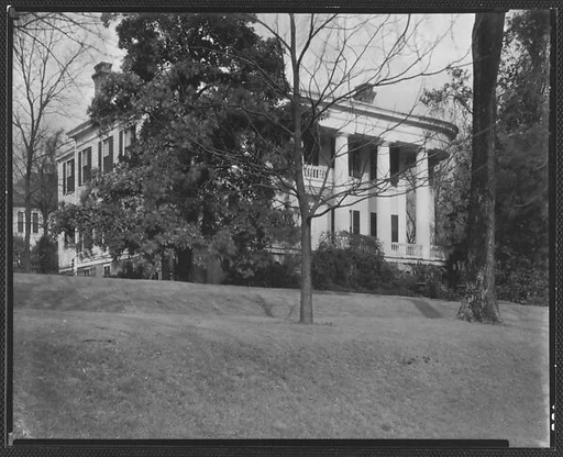 [Greek Revival House with Doric Capitals and Rounded Roof Corners, Macon, Georgia]