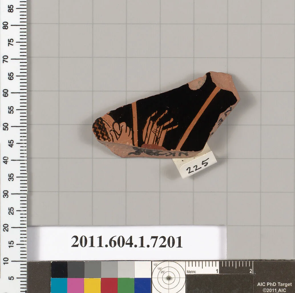 Terracotta fragment of a kylix (drinking cup) — Makron