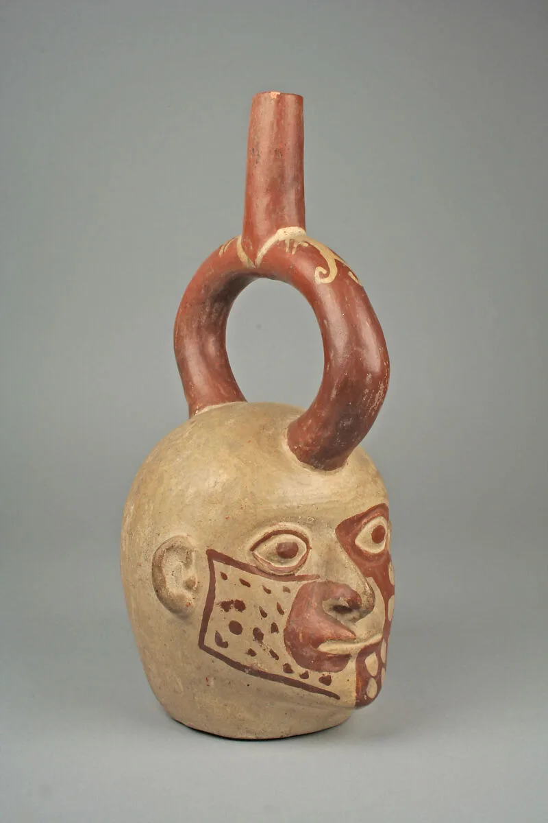Stirrup Spout Bottle with Tattoed Head — Unknown