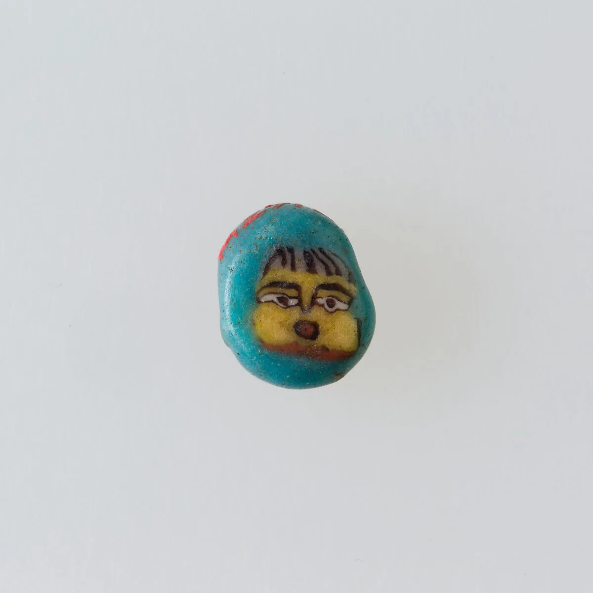 Inlay / bead blank with face — Unknown