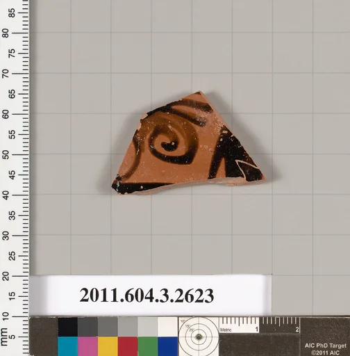 Terracotta fragment of a kylix (drinking cup)