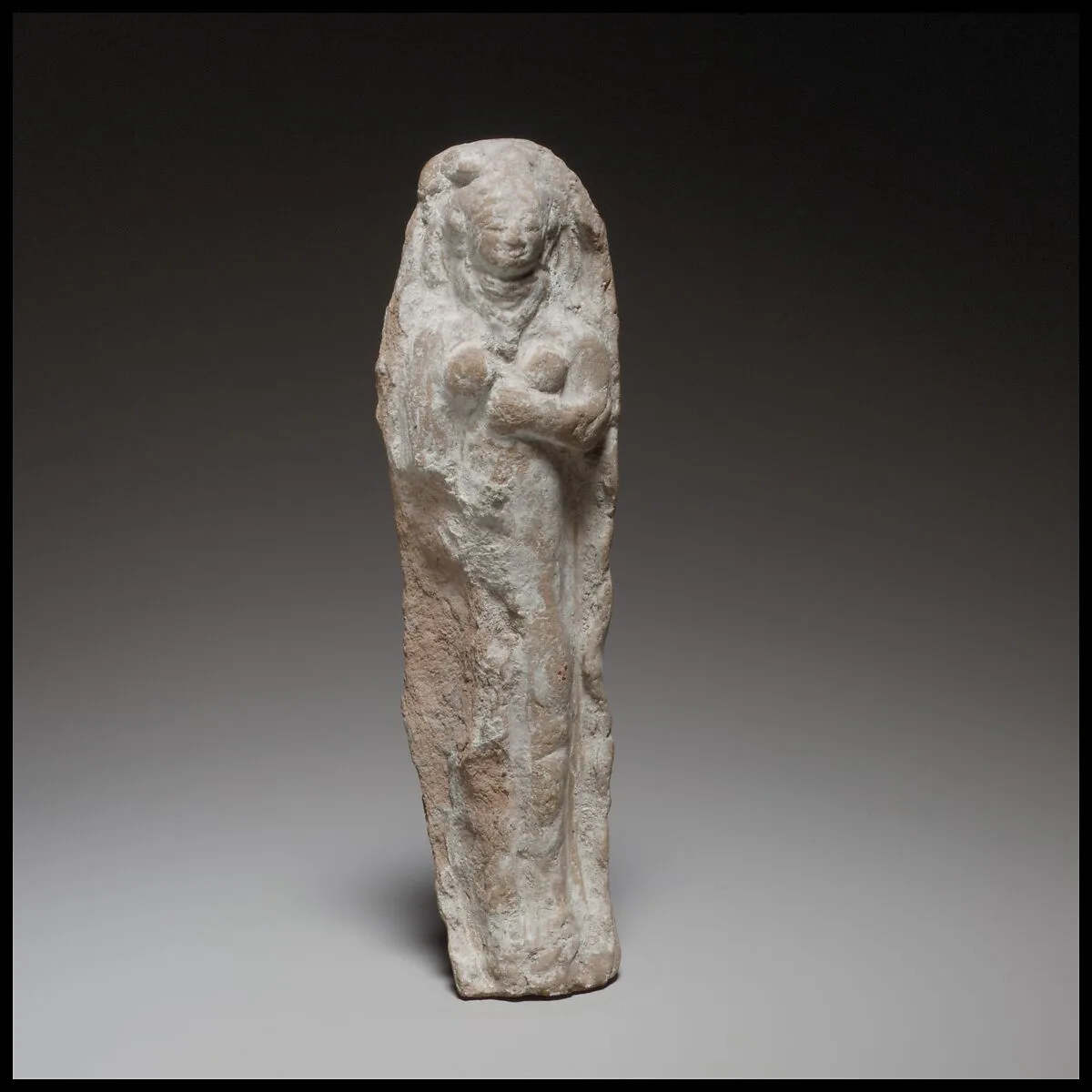 Standing female figurine — Unknown