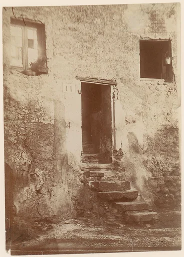 [Doorway Into Crumbling Brick Building]