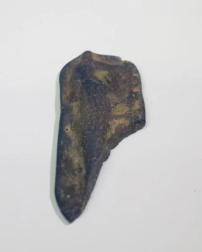 Mold-pressed amulet or fragment