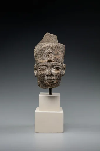 Head of a king in the red crown