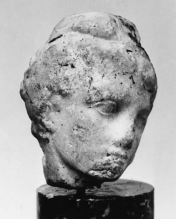 Marble head of a youth from a relief — Unknown