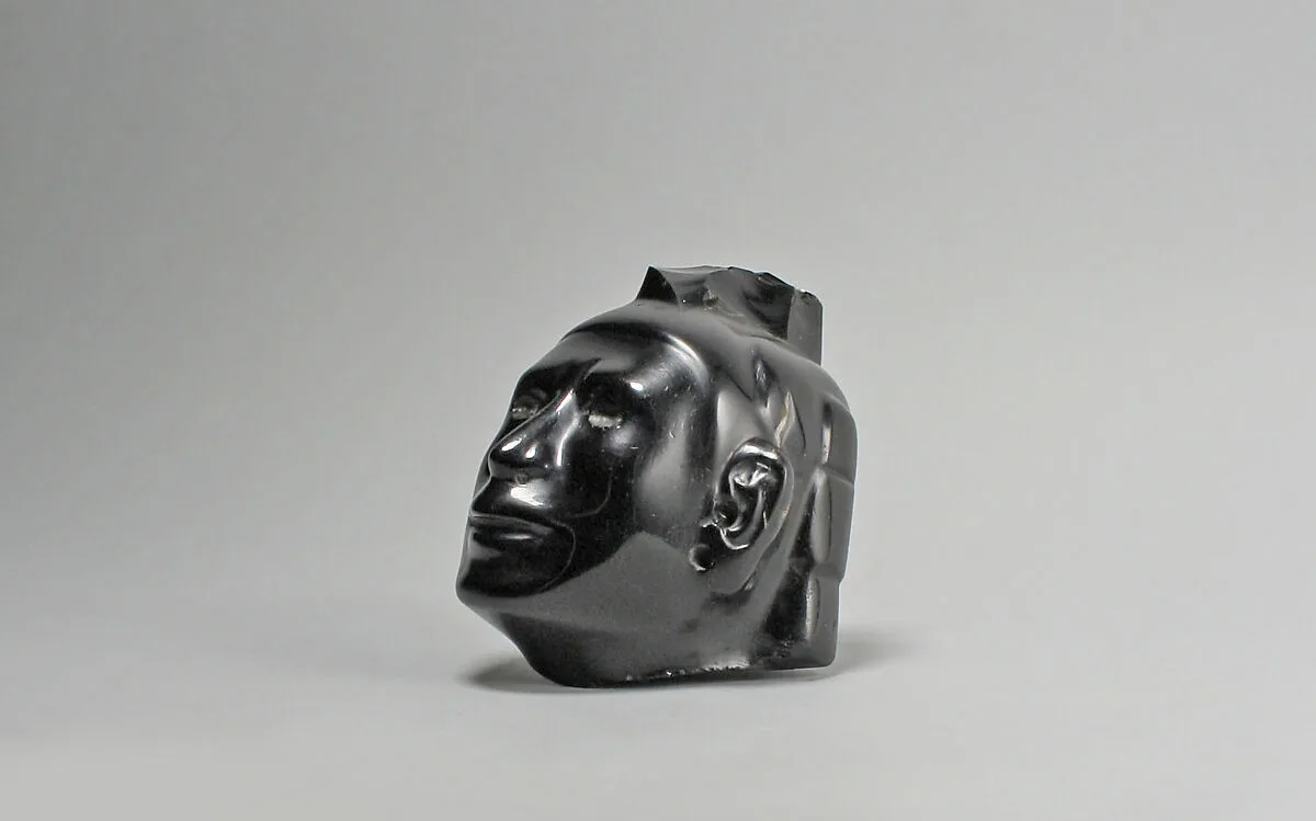 Head from a figure, Xochipilli-Macuilxochitl — Unknown