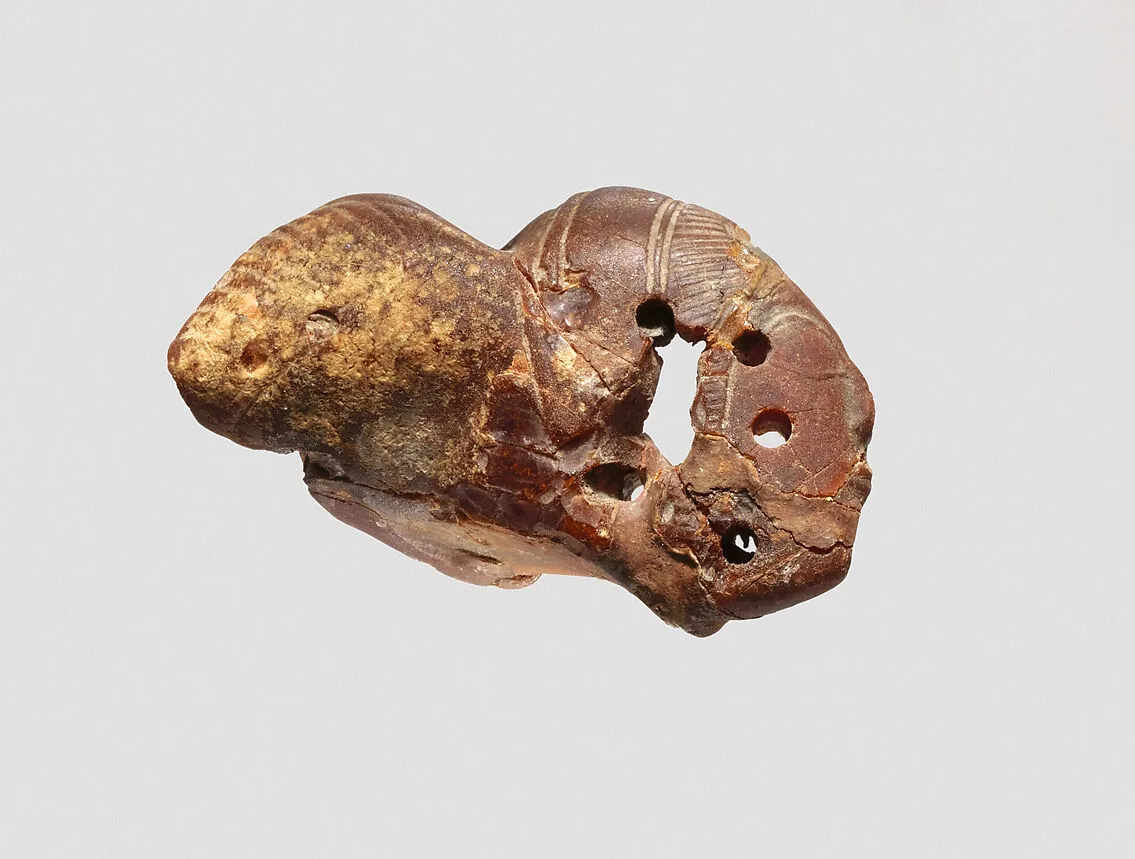 Pendant: winged female head — Unknown