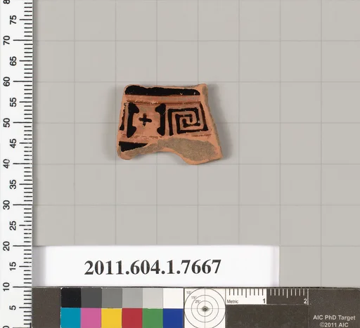 Terracotta fragment of a kylix (drinking cup)