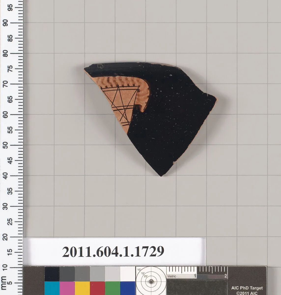 Terracotta rim fragment of a kylix (drinking cup) — Telephos Painter