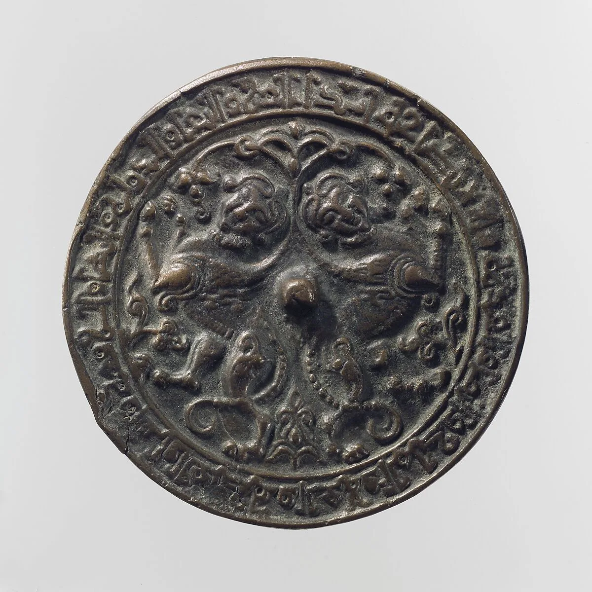Mirror with a Pair of Addorsed Sphinxes with Scorpion Tails — Unknown