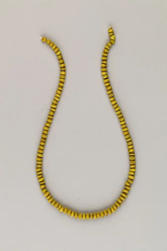 String of 115 discoid ridged beads