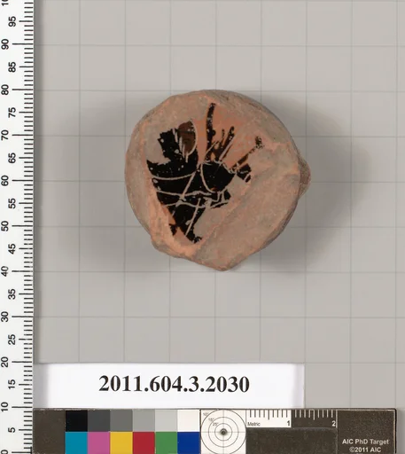 Terracotta fragment of a kylix (drinking cup)