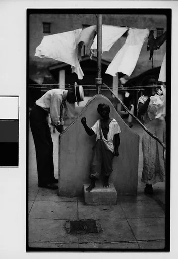 [Man at Communal Laundry in Courtyard, Havana]