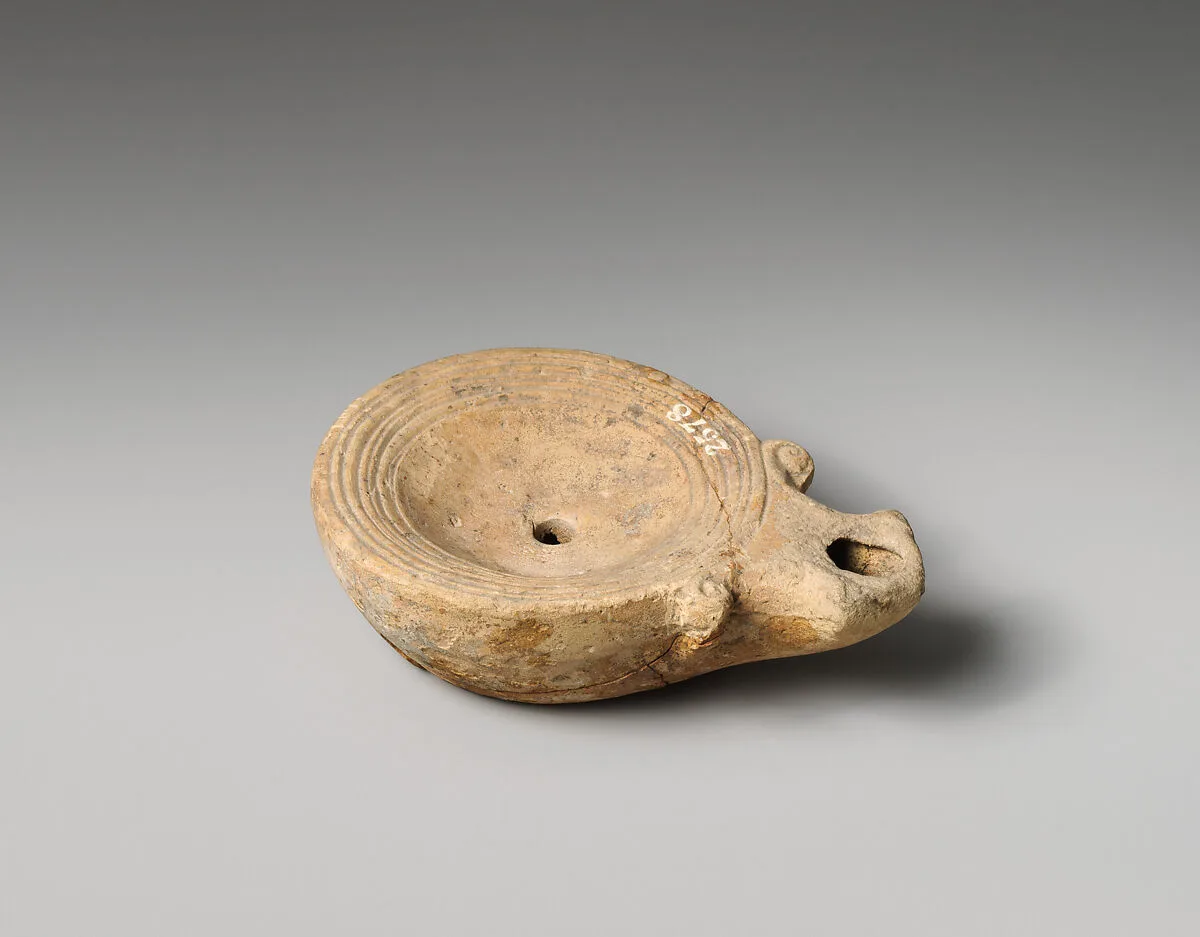 Terracotta oil lamp — Unknown