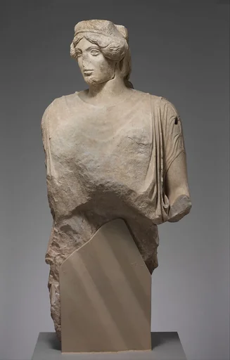 Upper part of a marble statue of a woman