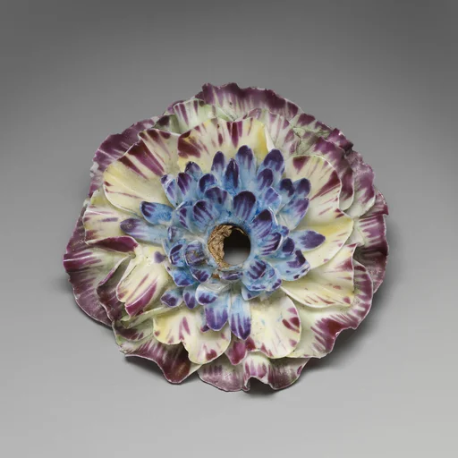 Porcelain flower (one of a set of nine)