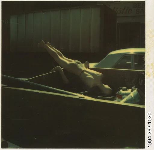 [Mannequin in Bed of Pick-Up Truck]
