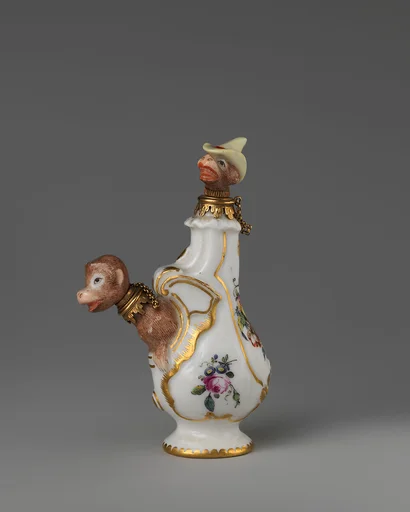 Monkeys within vase