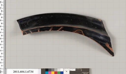 Terracotta rim fragment of a kylix (drinking cup)