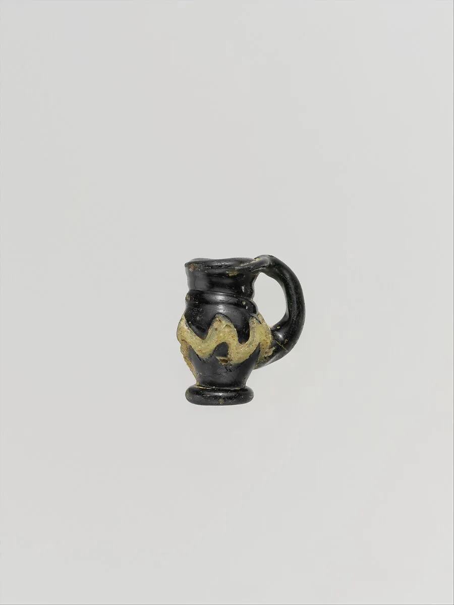 Glass pendant in the form of a miniature jug — Unknown