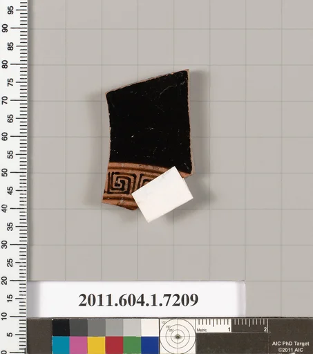 Terracotta fragment of a kylix (drinking cup)