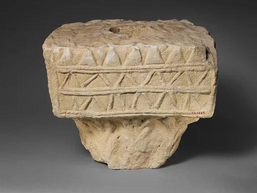 Limestone votive square capital