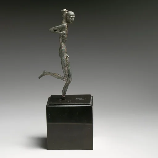 Bronze statuette of a runner