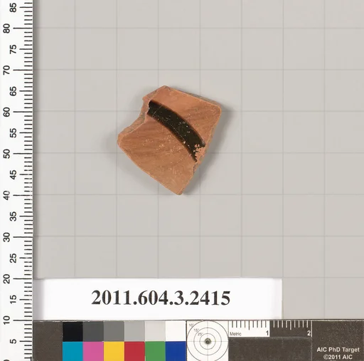 Terracotta fragment of a kylix: eye-cup (drinking cup)