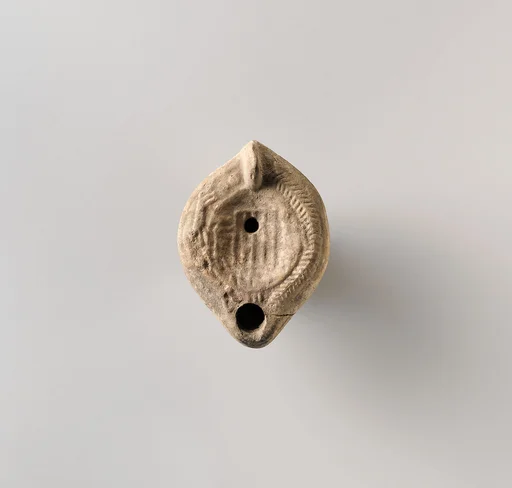 Terracotta oil lamp