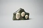 Stone Relief with Three Bone Masks — Martha Nuyaitok