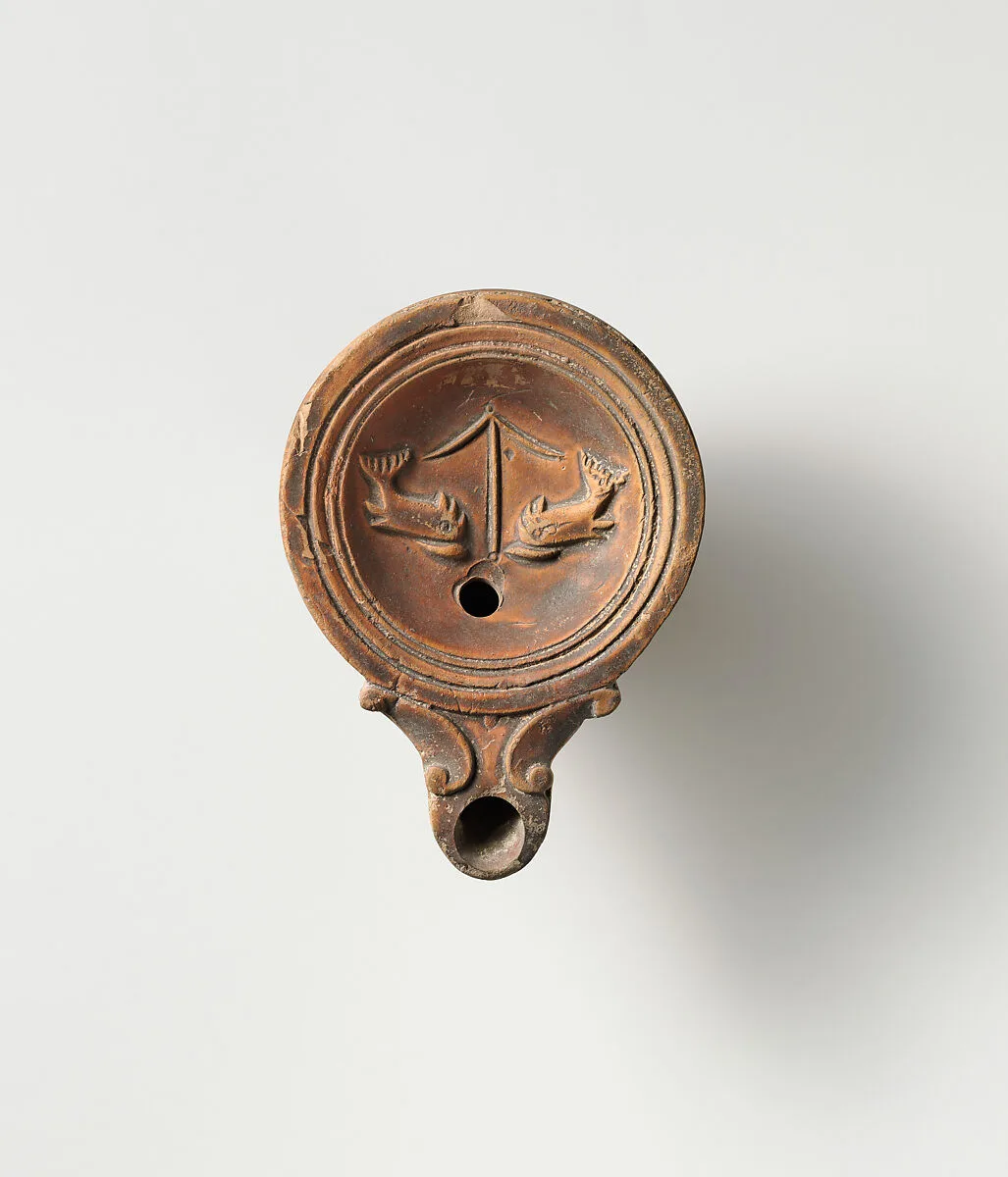 Terracotta oil lamp — Unknown