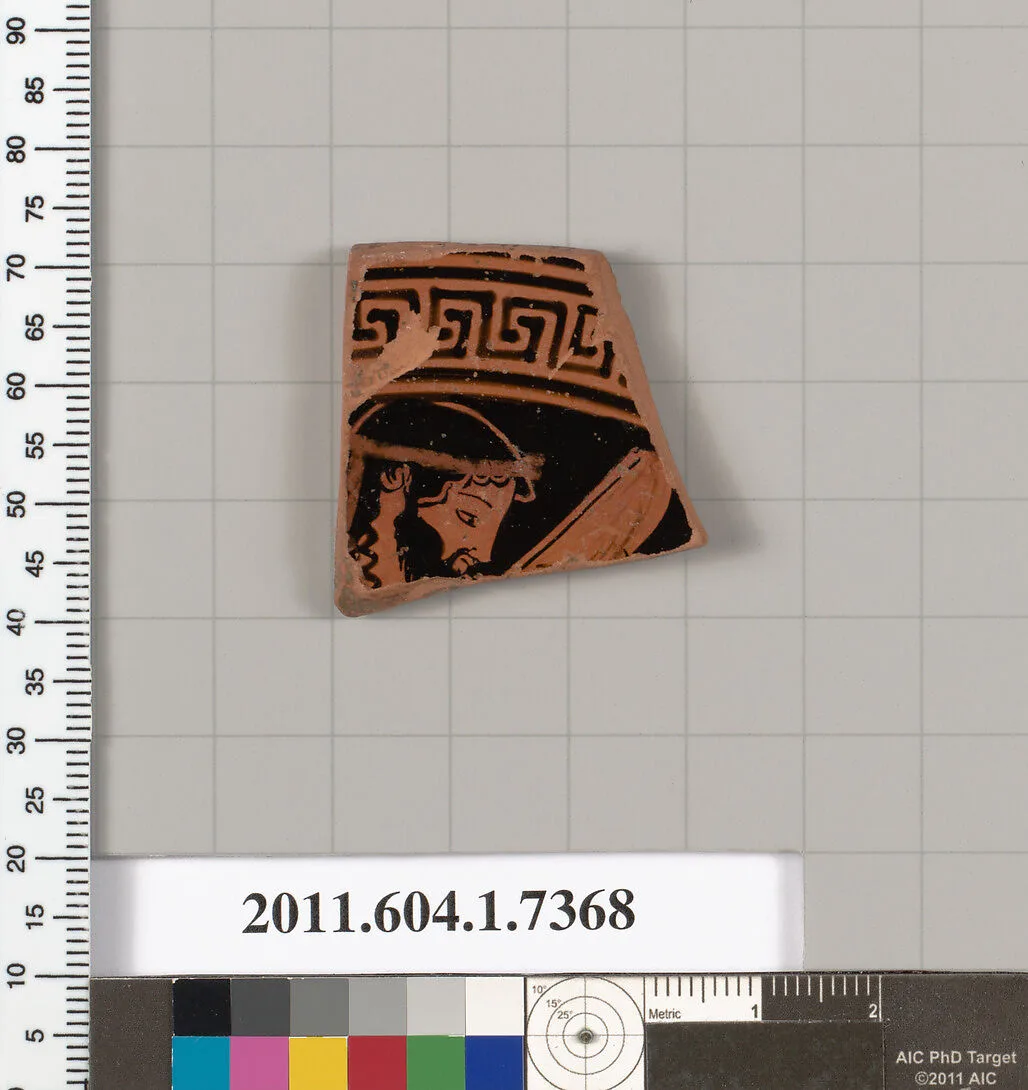 Terracotta fragment of a kylix (drinking cup) — Makron