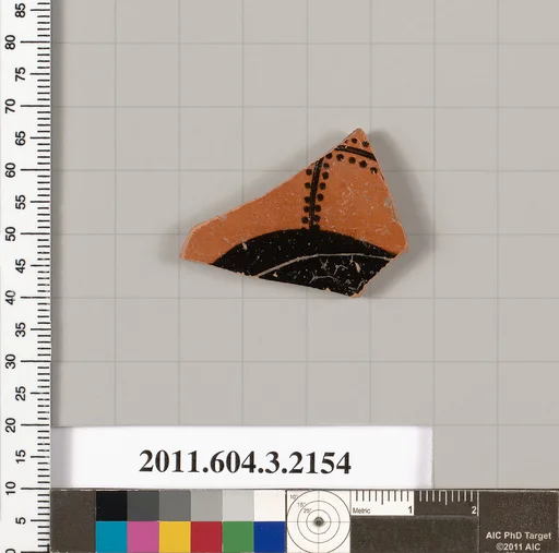 Terracotta fragment of a kylix (drinking cup)