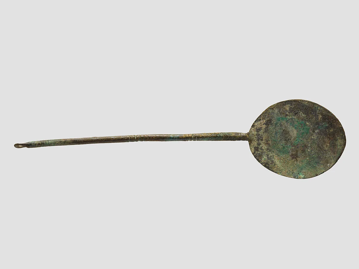 Cosmetic spoon pendant — Unknown