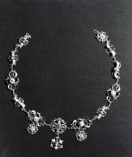 Necklace Formed of Fifteen Dress Ornaments