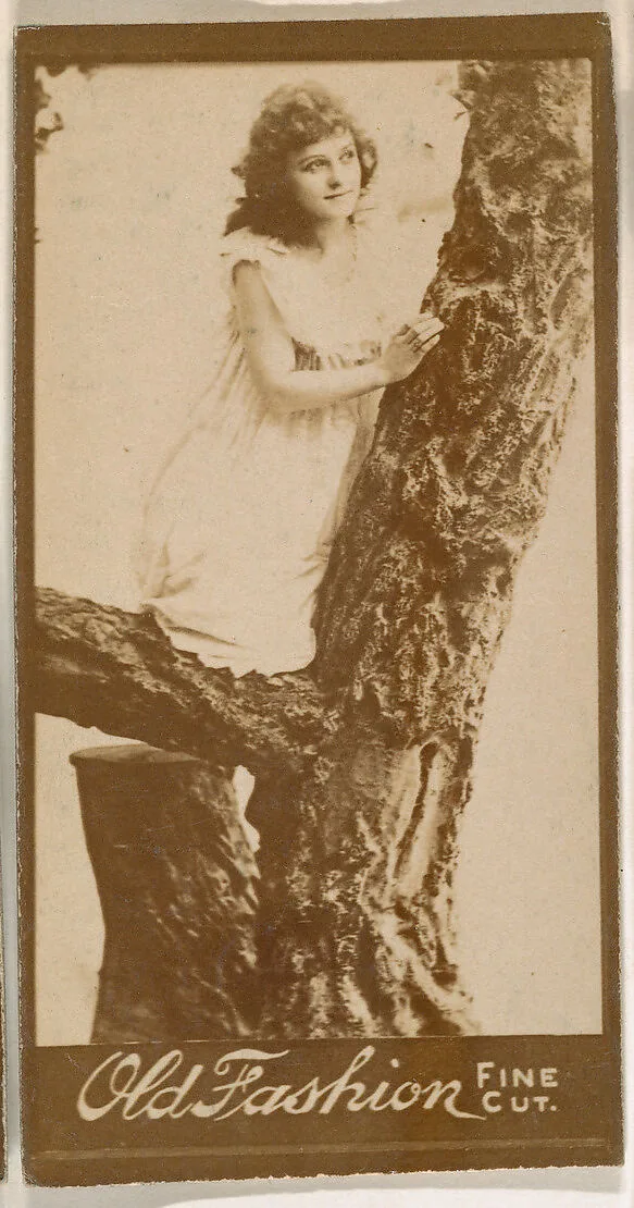 Actress climbing tree, from the Actresses series (N664) promoting Old Fashion Fine Cut Tobacco — Unknown