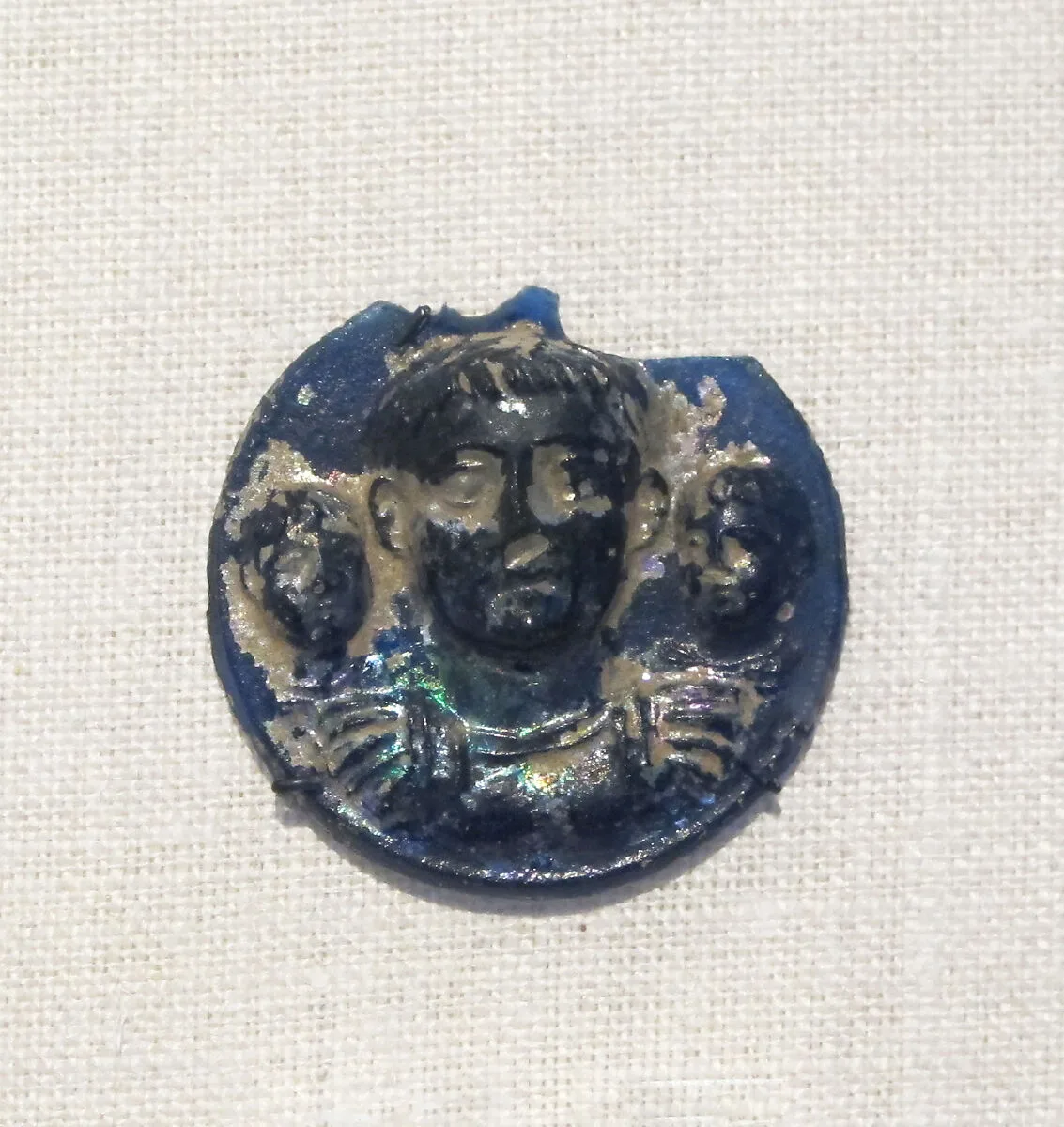 Glass phalera (medallion) with imperial portraits — Unknown