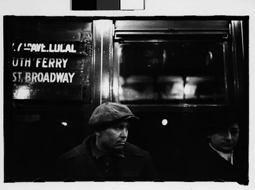 [Three 35mm Film Frames: Subway Passengers, New York City: Men in Caps, Woman in Hat and Gloves Beneath "7th Ave Local" Sign]