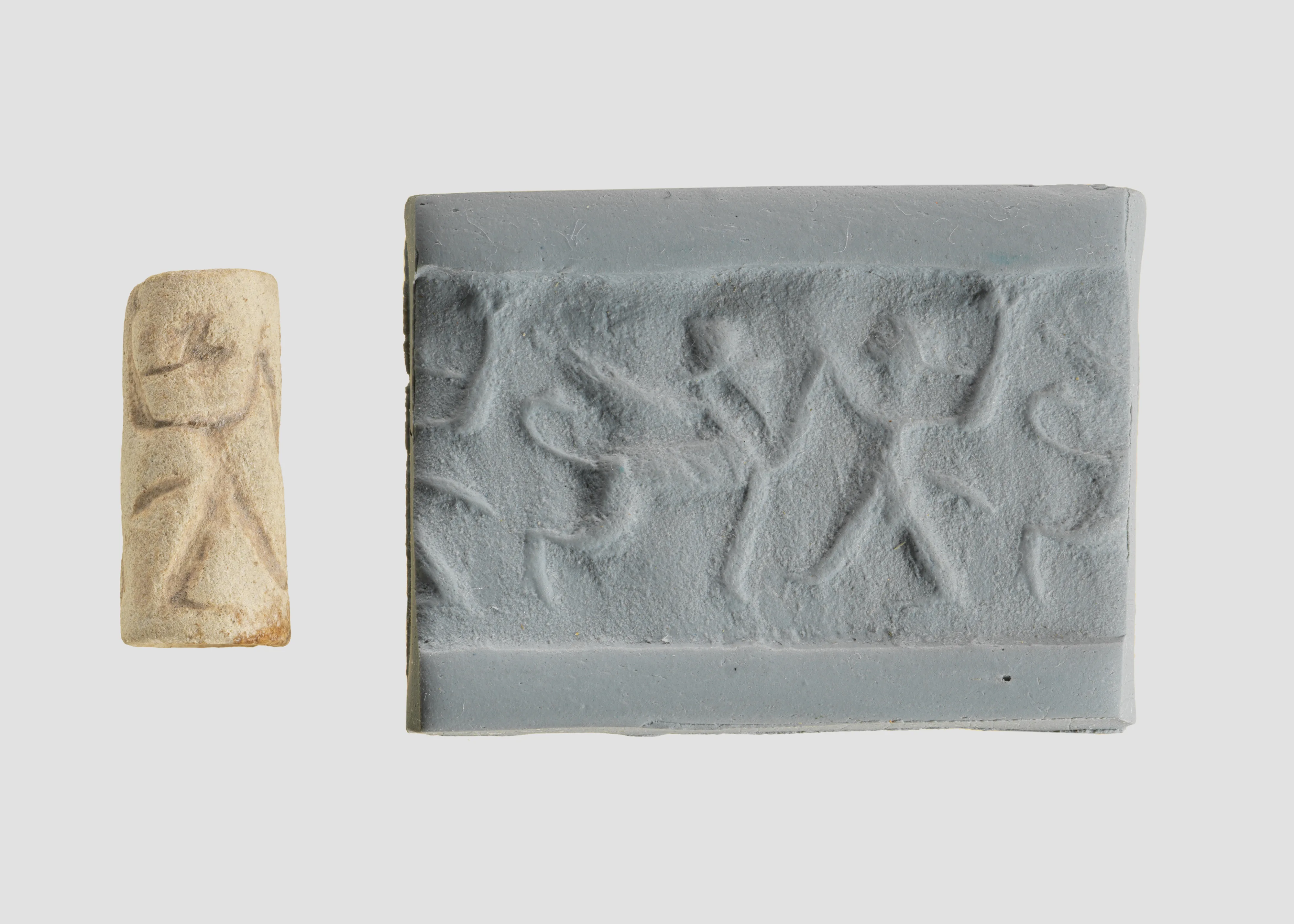 Cylinder seal with two-figure contest scene — Unknown